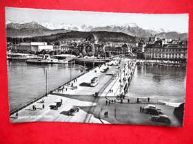 Lucern - Luzern, Švýcarsko, most, auta, tramvaje (pohled)