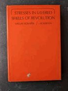 Stresses in layered shells of revolution